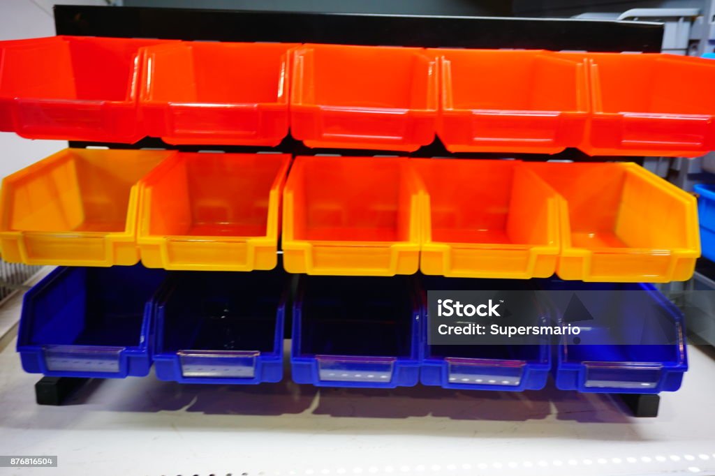 Empty Plastic Storage Bins Containing For Screws Stock Photo