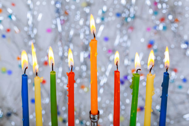 istock Brightly Glowing Hanukkah Menorah - Shallow Depth of Field 876822692