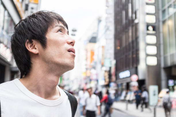 istock Young man in the city 876824900