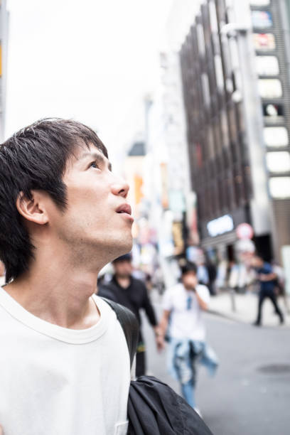 istock Young man in the city 876825272