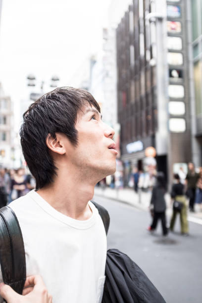 istock Young man in the city 876825714