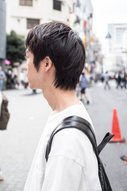 istock Young man in the city 876828402