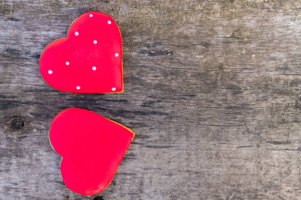 istock Heart shaped cookies for valentine day on rustic wooden table 876829130