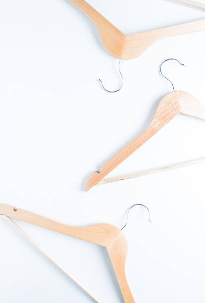 istock Wooden hanger on white background 876832222
