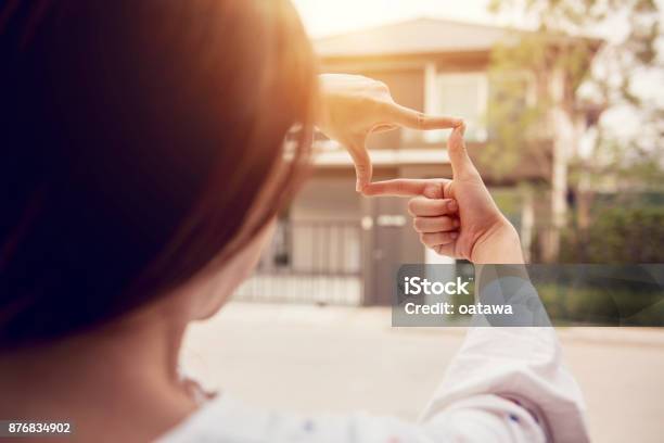Hands Of Woman Making Frame Gesture With Home Background Planning For The Future Resident Concept Stock Photo - Download Image Now