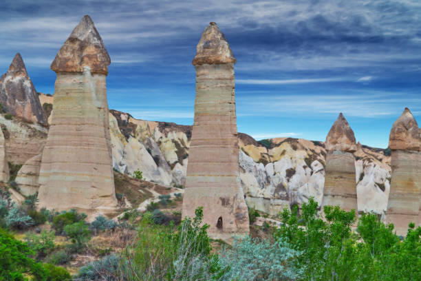 Love valley rock formations, mountain landscape in Cappadocia, Turkey Love valley rock formations, mountain landscape in Cappadocia, Turkey phallus shaped stock pictures, royalty-free photos & images