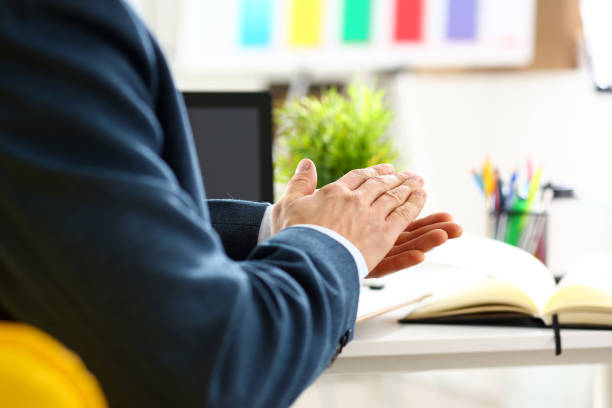 man in suit clap his arms congrats - hands clasped business education cooperation imagens e fotografias de stock