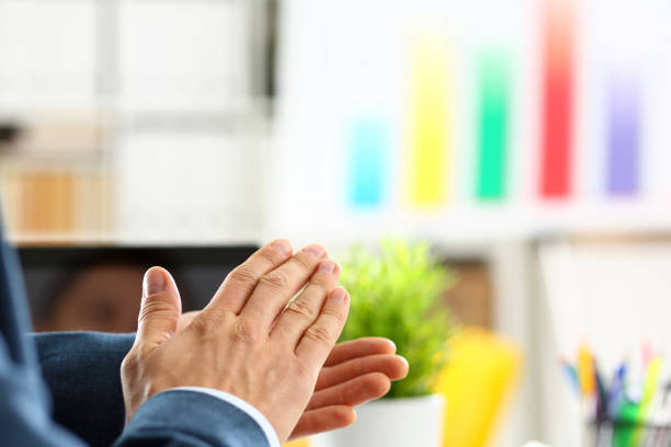 man in suit clap his arms congrats - hands clasped business education cooperation imagens e fotografias de stock