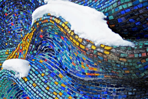 On the old wall from smalt. With snow.
