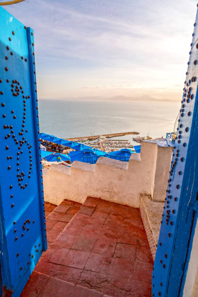 Sidi Bou Said, Tunisia Typical Tunisian, Arabian, Mediterranean architecture in Sidi Bou Said, famous touristic town near Tunis, Tunisian capital.North African Mediterranean coast. tunisia beach stock pictures, royalty-free photos & images