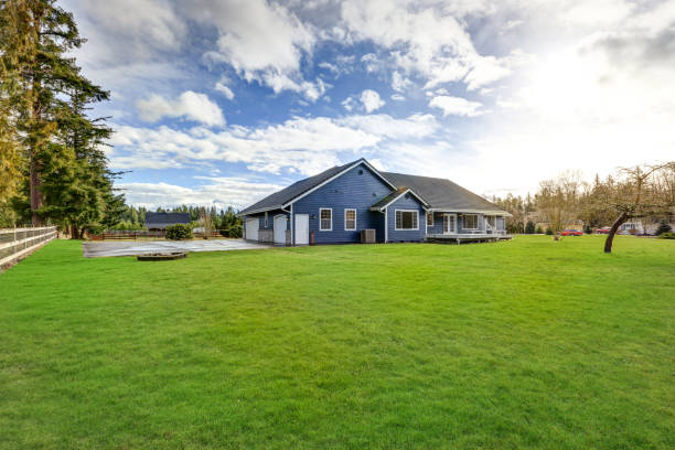 istock Beautiful blue rambler house with tile roof 876842236