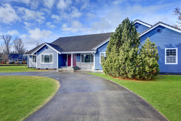 istock Beautiful blue rambler house with tile roof 876844454