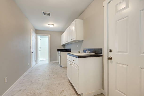 istock Light beige interior of tiled mudroom 876845034