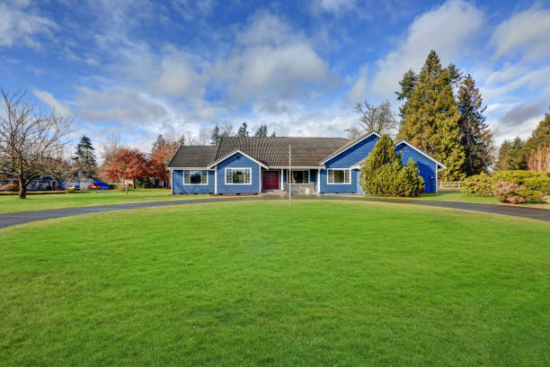 istock Beautiful blue rambler house with tile roof 876845210