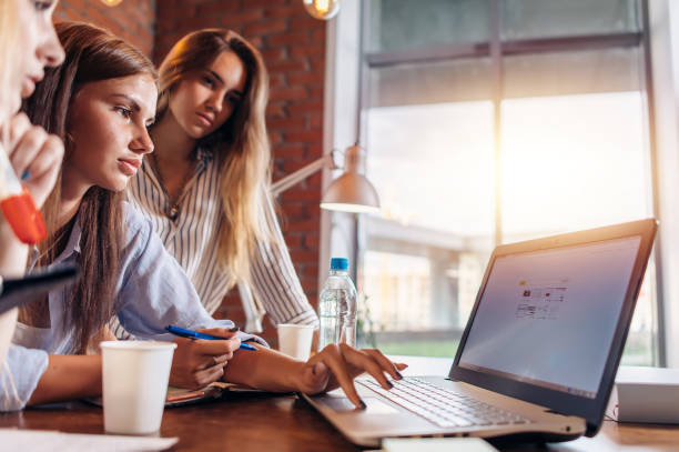 istock Team of creative business people using a laptop 876845216