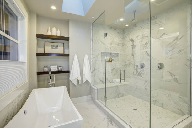 Amazing master bathroom with large glass walk-in shower stock photo