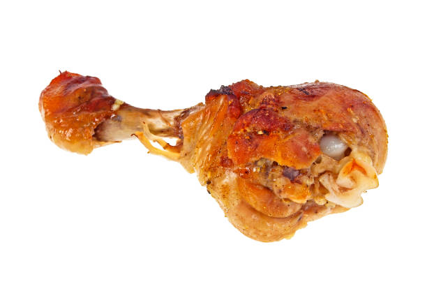 istock Grilled chicken leg on a white background 876858850