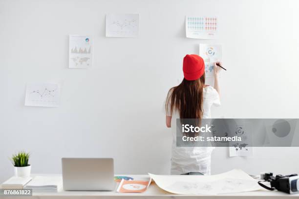 Woman Working On Infopraphic At Home Office Stock Photo - Download Image Now - Freelance Work, Adult, Adults Only