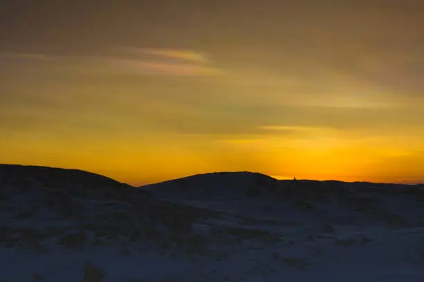 These pictures were taken at Larsemann hills at antarctica on 07-11-2017. The clear skies and the pure clarity of sky is really awesome. This picture was taken after the end of polar nights at Antarctica. There was visible mirage phenomenon and a minute view of the sun just peeping above the horizon.