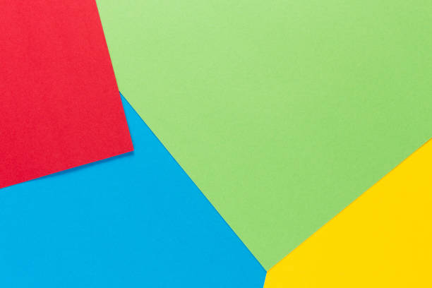 istock Color papers geometry flat composition background with yellow, green, red and blue tones 876865174