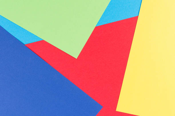 istock Color papers geometry flat composition background with yellow, green, red and blue tones 876865484