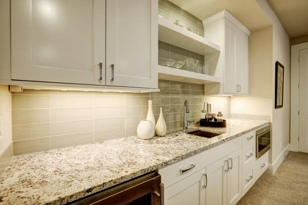 istock Chic living room features wet bar nook 876865626
