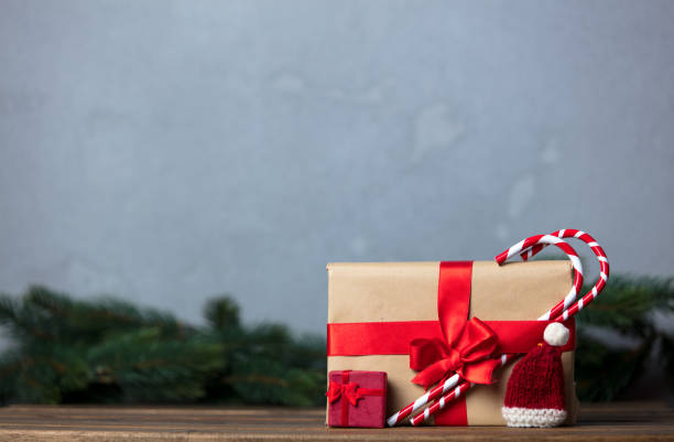 istock Christmas gift with bowknot and lollipop 876873722