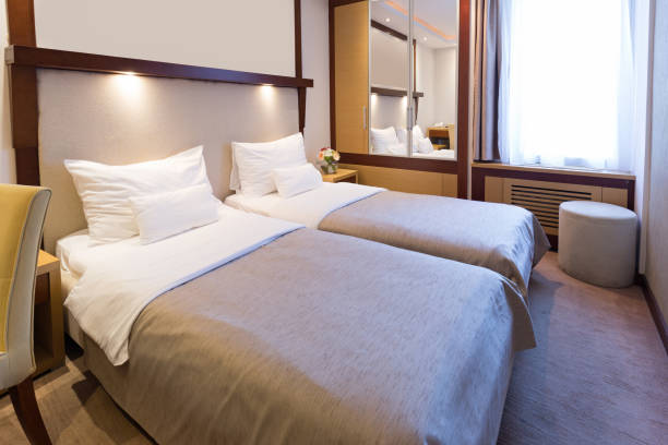 istock Interior of a hotel bedroom 876877318
