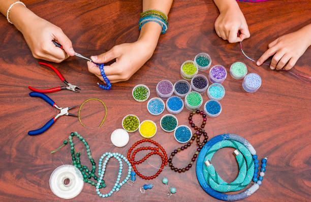 istock Making of handmade jewellery. 876880044