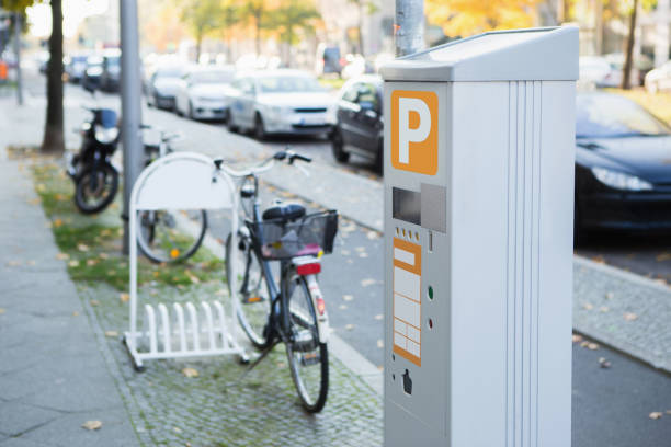 Parking machine with solar panel in the city street. Pay On Foot Parking System