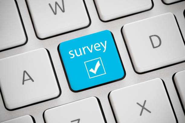Survey Blue colored 'survey' button on a keyboard. computer key photos stock pictures, royalty-free photos & images