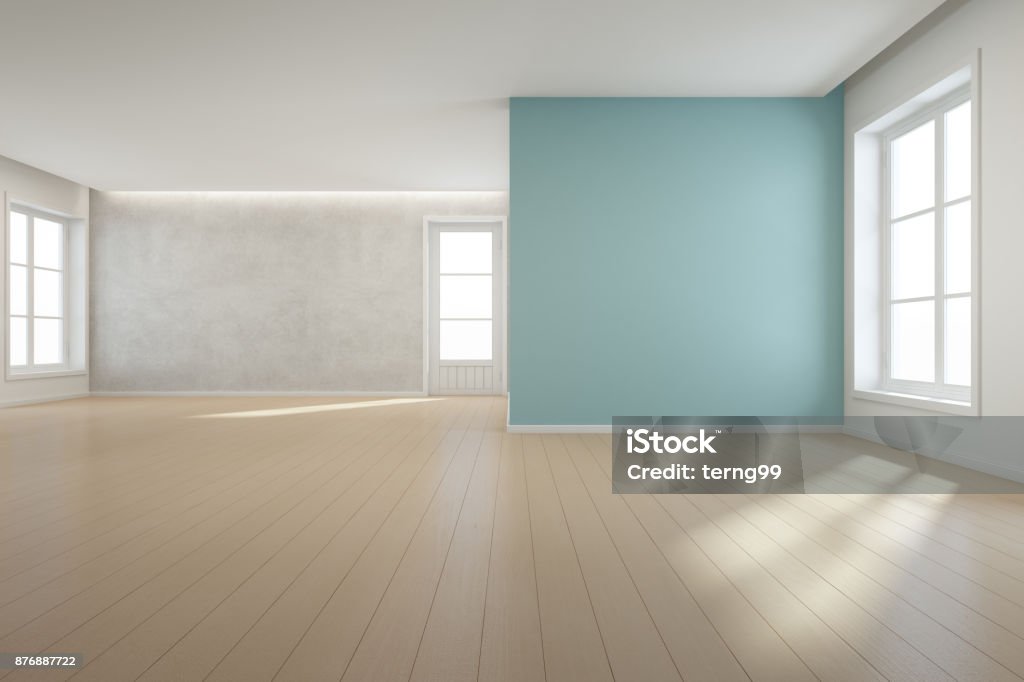 Wooden floor with blue concrete wall background in large room at modern new house for big family, White vintage window and door of empty hall or natural light studio 3D rendering of home interior without furniture Indoors Stock Photo