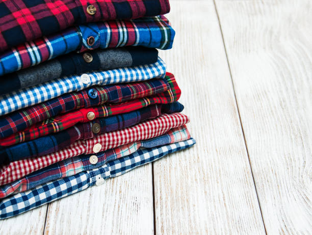 istock stacks of checkered shirts 876895718