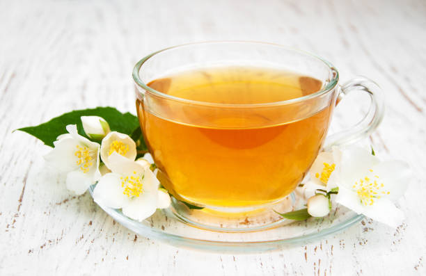 istock Cup of tea with jasmine flowers 876895776