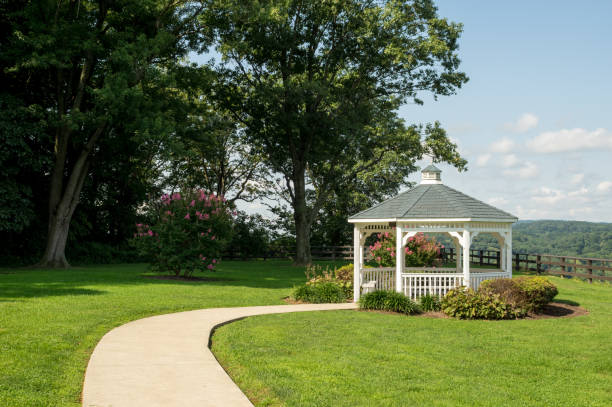 istock Pavilion Gazebo in a Garden Park 876895858