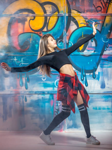 istock Cheerful Girl Dancing Hip Hop 876899330