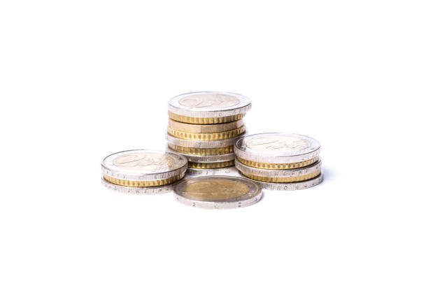 istock Several stacks of Euro coins on white background 876902876