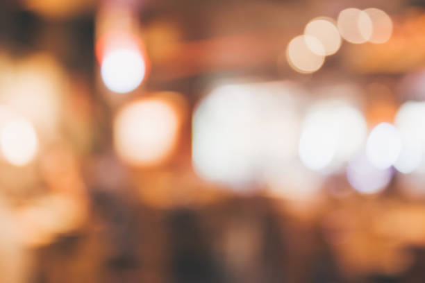 istock Restaurant cafe or coffee shop interior with people abstract blur background 876902942