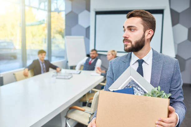 istock Bearded Businessman Leaving Job 876903706