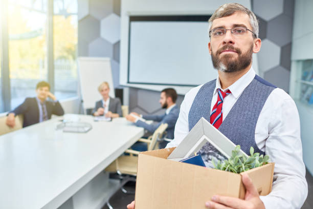istock Mature Businessman Leaving his Job 876903718