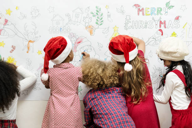 istock Kids drawing on a Christmas decoration 876903902