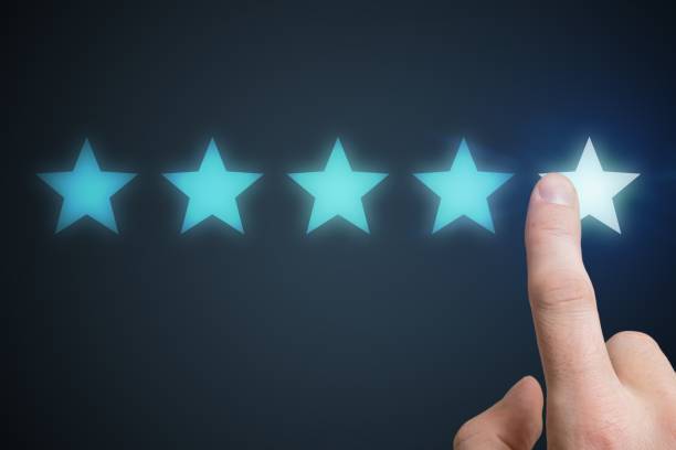 istock Human hand is rating with 5 stars. Ranking and customer satisfaction concept. 876906246