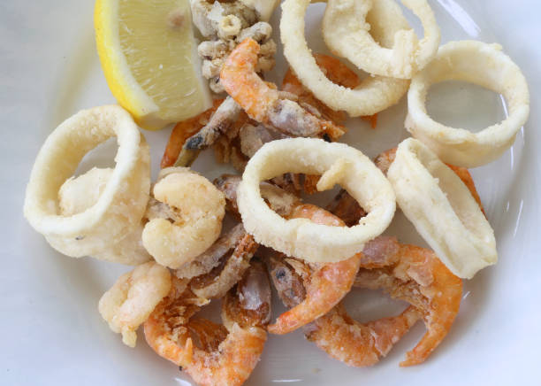 istock Tasty and salty fried fish and shrimp takeaway 876907252