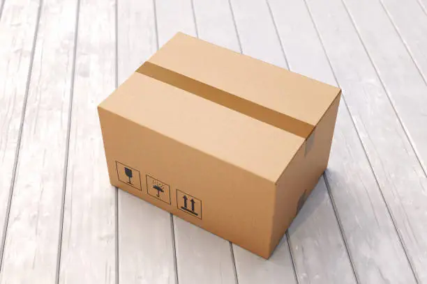 Photo of Cardboard box on porch floor