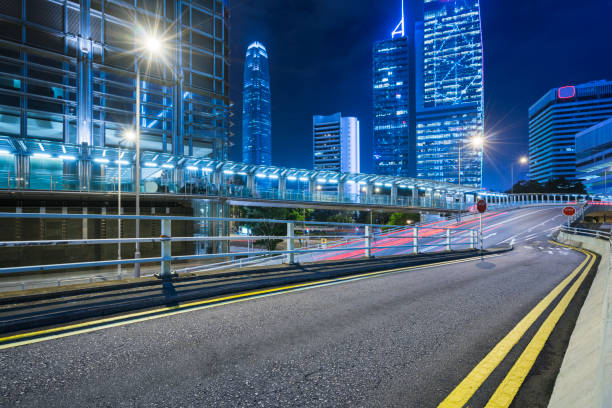 istock empty street in downtown Hong Kong at night 876915278