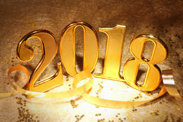 istock Gold 2018 and gold background. 876917002