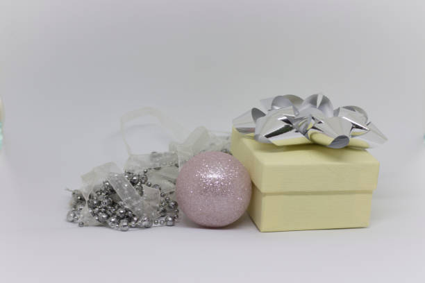 istock White gift box and Christmas tree toy 876917032