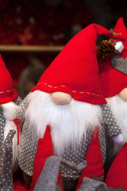 istock Funny Christmas dwarf with big nose 876919382