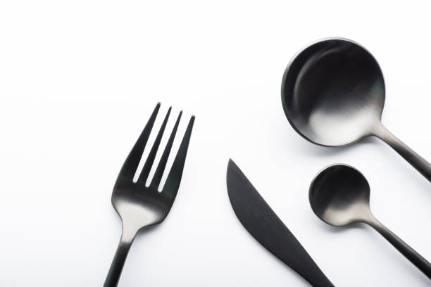 istock Cutlery set with black fork, knife and spoon 876919644