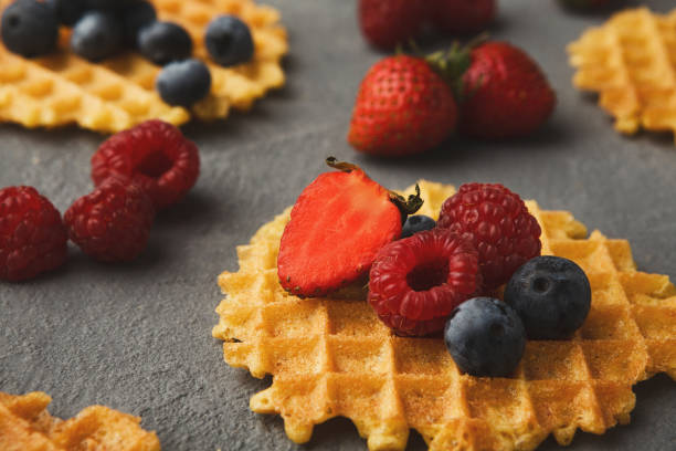 istock Round belgium waffles with berries 876923668